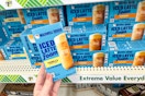 hand holding a box of maxwell house iced latte with foam drink mix at dollar tree