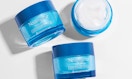 blue jars of face serum 