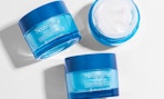 blue jars of face serum 