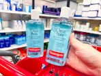 2 neutrogena clear pore astringent bottles sitting on top a target cart
