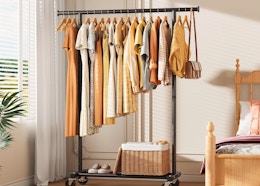 clothes on a rack in a room
