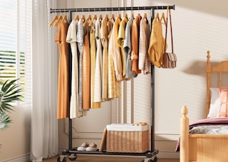 clothes on a rack in a room