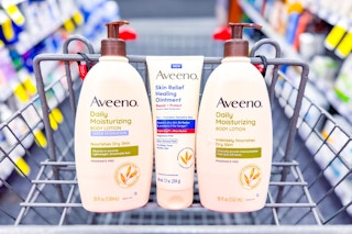 three aveeno body lotions in a cvs shopping cart