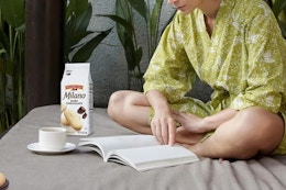 woman relaxing and enjoying Pepperidge Farm cookies 