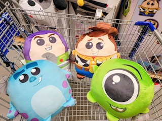 disney plushes in a cart