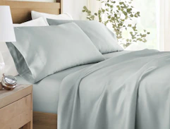 a sheet set on a bed 