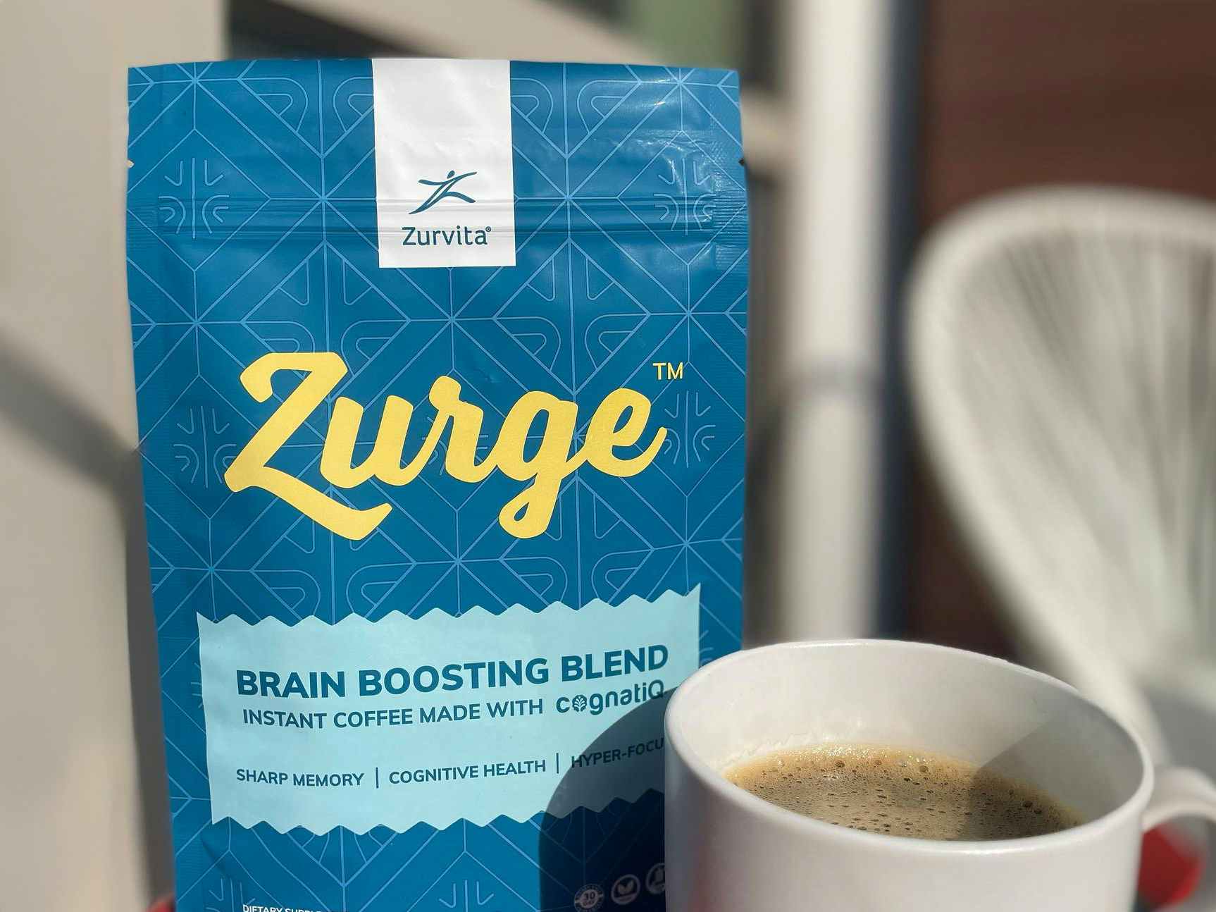 a bag of zurge coffee next to a mug