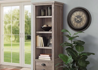 stock photo of better homes and gardens farmhouse bookcase staged in living room