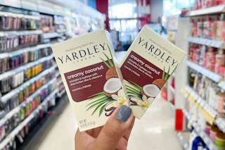 hand holding two Yardley bath bars