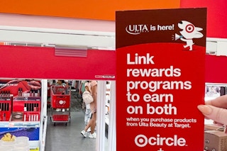 a target and ulta rewards flyer on shelf of ulta inside target