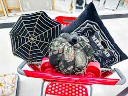 threshold halloween throw pillows sitting in a target cart