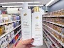 hand holding dove shampoos in walgreens