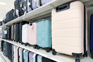 open story hardside luggage sitting on a target shelf