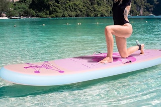 a woman on a paddleboard