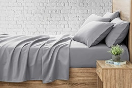 Lifestyle image of the Serta So Soft 4-Piece Light Gray Sheet Set (displayed on queen-sized bed)