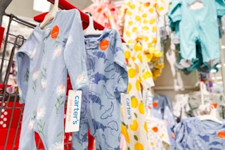 carter's sleep and plays hanging on a target cart