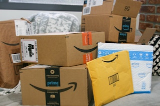 Amazon boxes on couch
