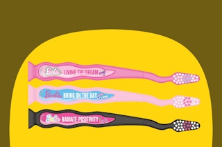a set of barbie firefly kids toothbrushes