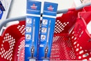 2 bissell featherweight lightweight vacuums in a cart