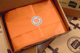 an open shipping box from unclaimed baggage