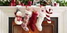 Pottery Barn stockings hanging together above a fireplace