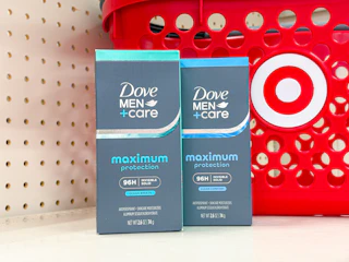 2 dove men+care antiperspirants sitting in front a target basket