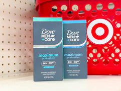 2 dove men+care antiperspirants sitting in front a target basket