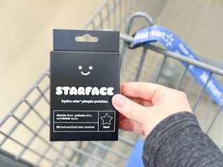 Starface Hydro Acne Patches (32 count) in black held over Walmart shopping cart