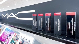 Mac Cosmetics lipticks on shelf with Bright Mac logo