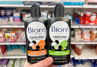hand holding biore charcoal face cleanser