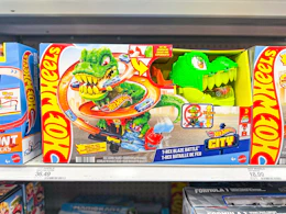 hot wheels t-rex blaze battle playset sitting on a target shelf