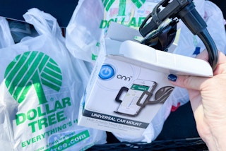cellphone car mount out if box in front of dollar tree bags