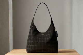 a coach bag in three different colors