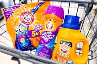 three arm and hammer laundry products in a shopping cart