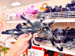 Hyde & Eek Spider Halloween Prop in stores at Target in front of 30% sale sign