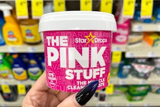 hand holding the pink stuff cleaner