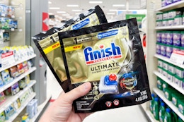 hand holding finish ultimate dishwasher packs at target