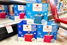 3 tonies disney starter sets sitting in front of a target shelf
