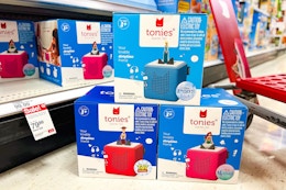 3 tonies disney starter sets sitting in front of a target shelf
