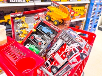 4 maxx action toys sitting in a target cart
