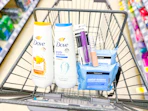 neutrogena, dove, and covergirl products in a walgreens cart