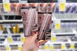 hand holding two maybelline sky high mascaras