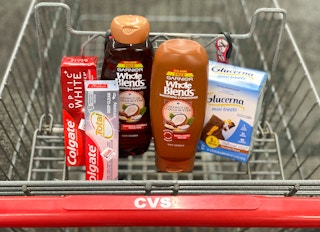 cvs shopping cart with colgate, garnier, and glucerna