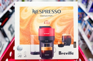 nespresso vertuo pop+ coffee maker sitting on a target cart