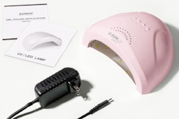 uv nail lamp on a table