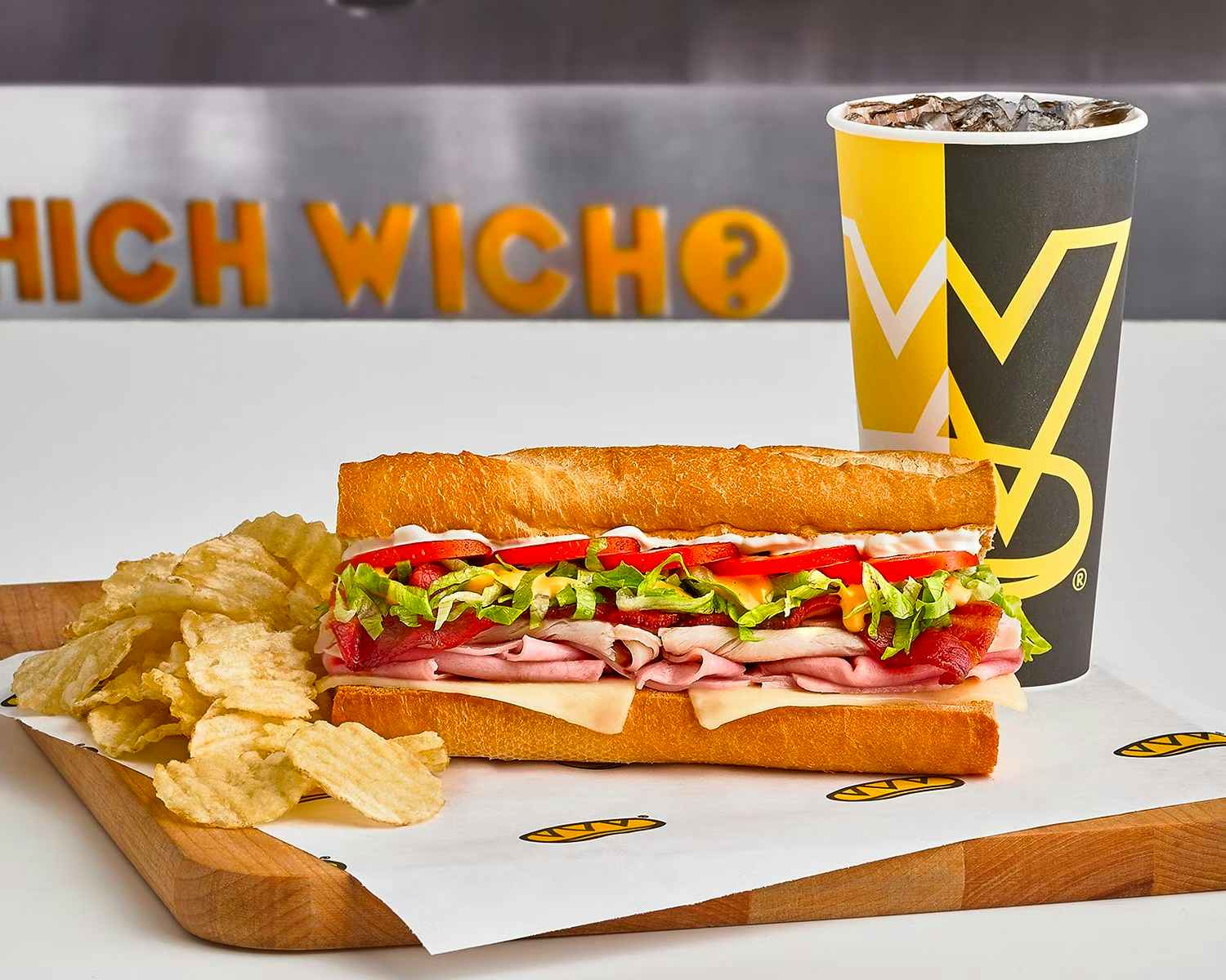 A meal from WhichWich restaurant on a table
