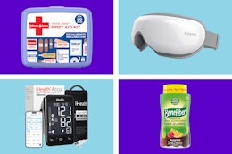 first aid kit eye massager blood pressure monitor fiber gummies on a blue and purple background