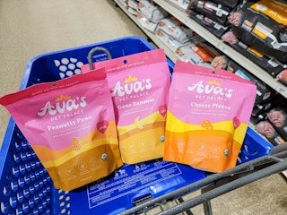 3 bags of organic dog treats in a cart