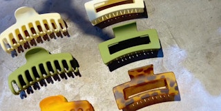 hair claw clips in natural colors on a grey background