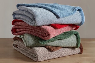 a stack of folded Fireside Throws